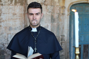 Scary priest with fangs raising eyebrow 
