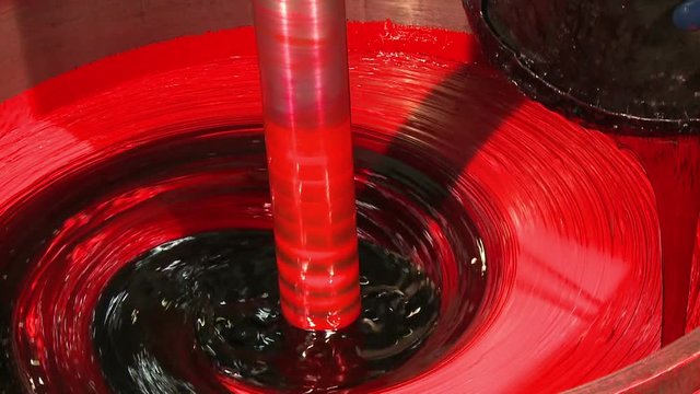 Yellow red industrial paint, oil paint mixing, paint factory, pantone paint colors, big mixer mixing oil paint