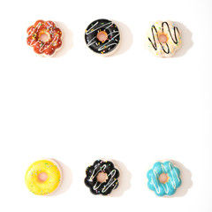 Fototapeta na wymiar Set of colorful donuts isolated on white background.