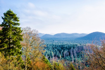 Panoramic view of the mountains against cloudy blue sky on a sunny winter day. Parc Naturel...