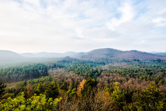 Panoramic view of the mountains against cloudy blue sky on a sunny winter day. Parc Naturel R&eacute;gional des Vosges du Nord. France, Lorraine