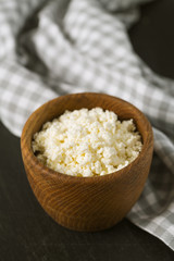 cottage cheese on black stone surface