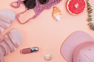 Fototapeta na wymiar Stylish feminime summer accessories of pastel pink color