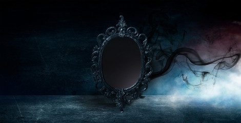 Mirror magic, fortune telling and fulfillment of desires. Fantasy with a mirror, dark room, magical...