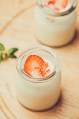Strawberry Yoghurt. Healthy food with Strawberries and yoghurt breakfast on table.