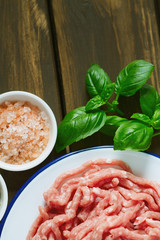minced meat on wooden surface