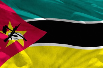 Waving Mozambique flag for using as texture or background, the flag is fluttering on the wind