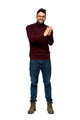 Fototapeta premium Full-length shot of Handsome man with glasses applauding after presentation in a conference on isolated white background
