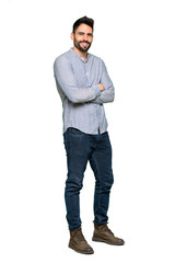 Full-length shot of Elegant man with shirt with arms crossed and looking forward on isolated white background