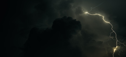 Lightning in a stormy clouds