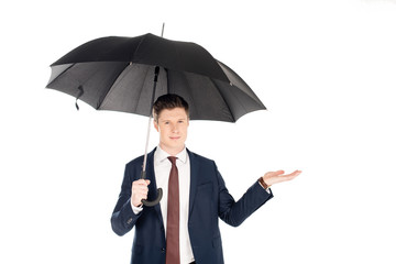 handsome businessman with umbrella checking rain, isolated on white