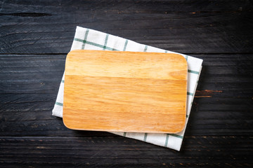 empty cutting wooden board with kitchen cloth