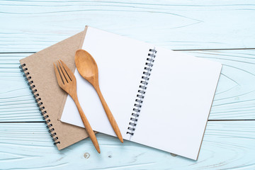 blank notebook for text note on wooden surface with copy sapce