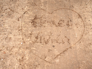 Heart drawn on sand of beach. Figure heart for you.