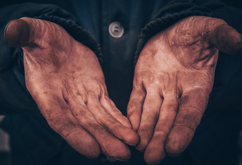dirty hands of a man, a working man, a man drained his hands while working, a poor man