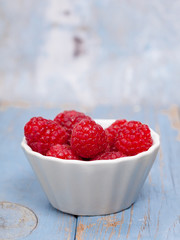 fresh raspberries in a bowl 
