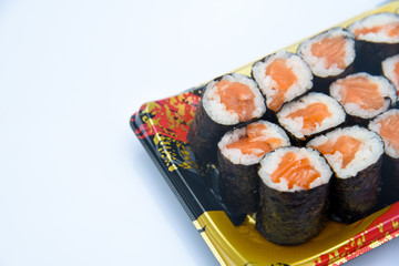 Sushi Roll with salmon on the white background .Food abstract background