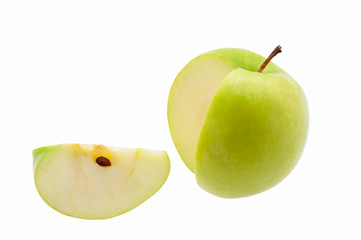 Green apple with a cut slice on a white background. Isolated.
