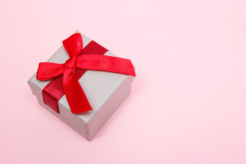 Gift box on pink background. March 8, mother's day, valentine, christmas concept.
