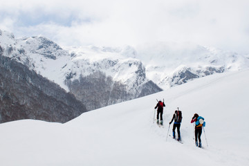 Fototapeta na wymiar people doing touring ski in a mountain covered of snow
