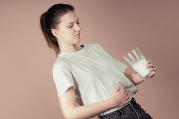 girl drinks milk and is happy