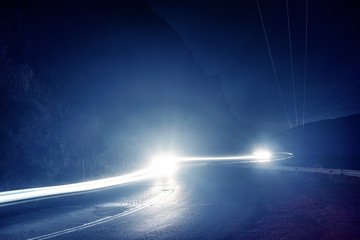 car light trails on serpentine road