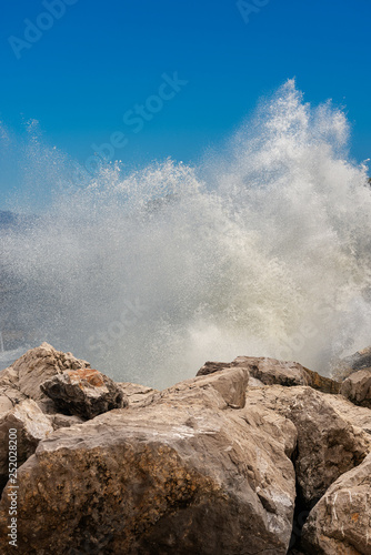 Sea Waves Break On The Rocks Breakwater And Splash Stock
