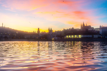 Naklejka premium View on Charles bridge and Prague castle in Prague, Czech Republic, at sunset. Beautiful travel background