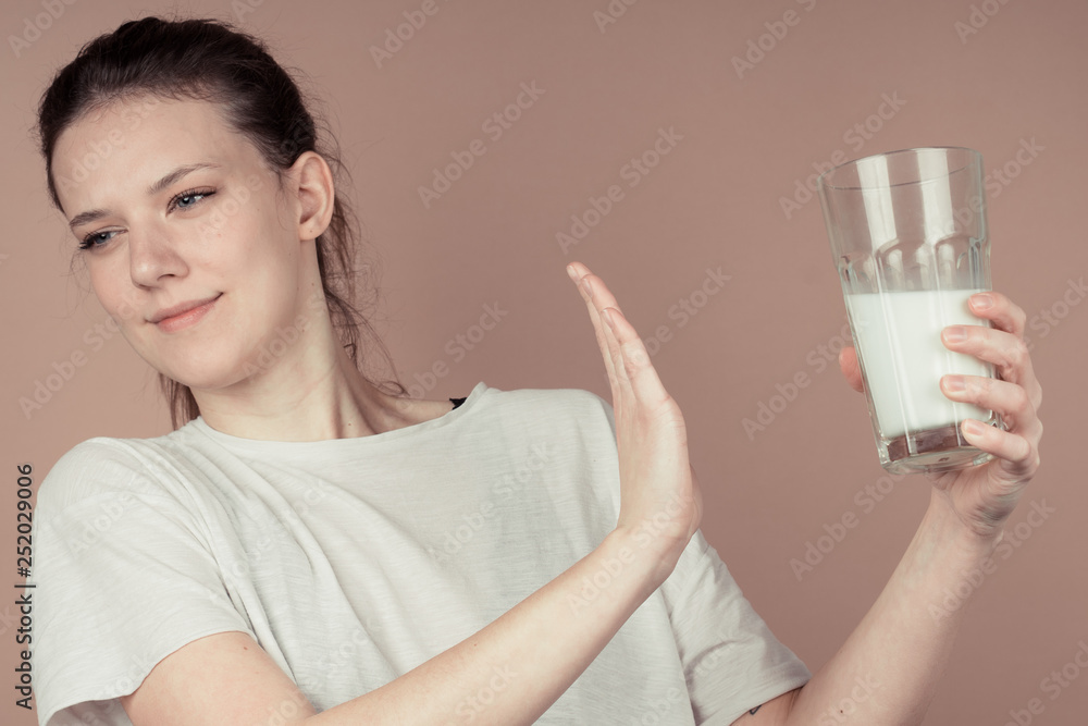 Wall mural girl drinks milk and is happy