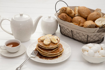 Breakfast with pancakes and tea