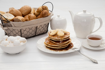 Breakfast with pancakes and tea