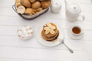 Breakfast with pancakes and tea