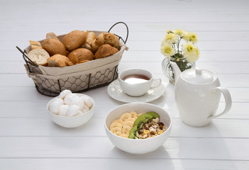 Breakfast with oatmeal porridge on wooden table. Healthy breakfast concept. Top view