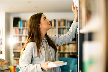 Young student in library 