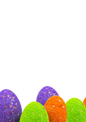 colorful easter eggs on green background