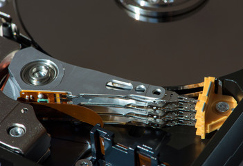 Inside the hard drive from the computer. Part of computer p c, laptop.Hard disk on a white background.