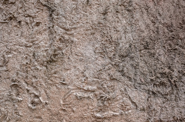 rough stone wall in brown color
