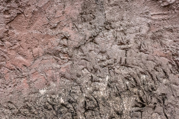 rough stone wall in brown color