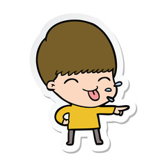 sticker of a cartoon boy sticking out tongue