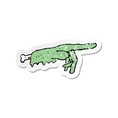retro distressed sticker of a cartoon pointing zombie hand