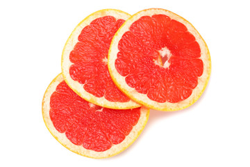 healthy food. sliced grapefruit isolated on white background. top view