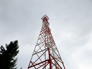 Radio tv radio communication. Communication tower in the forest close up.