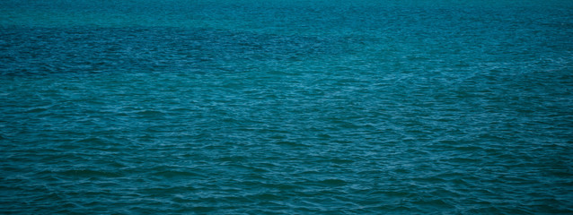 Obraz premium Calm blue turquoise ocean surface background