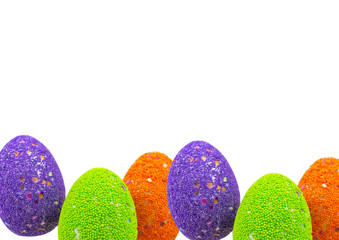 colorful easter eggs on green background