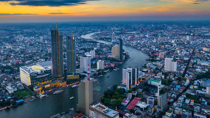Fototapeta na wymiar Bangkok City aerial view, Aerial view from above of skyscraper and chao phaya river in Bangkok, Thailand.