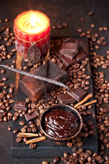 Spa chocolate set with candle  and soap on  dark  background