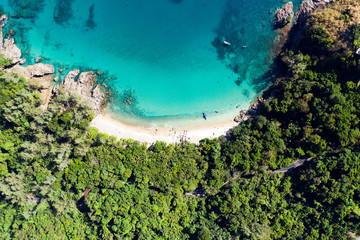 Fototapeta na wymiar View from above, aerial view of a beautiful tropical beach with white sand and turquoise clear water, Banana beach, Phuket, Thailand.