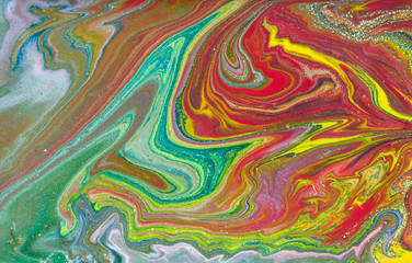 Multicolored gold marbling pattern. Golden marble liquid texture.