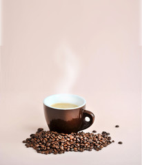 brown coffee Cup and coffee beans