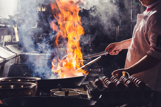 Chef Stir Fry In Wok